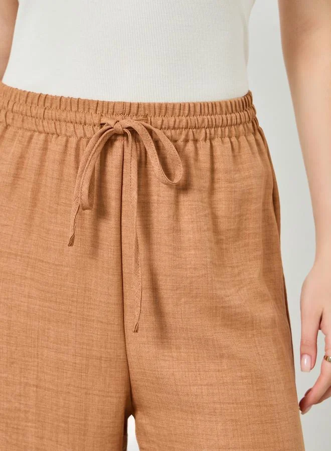 Styli Women Beige Linen Look Wide Leg Trousers
